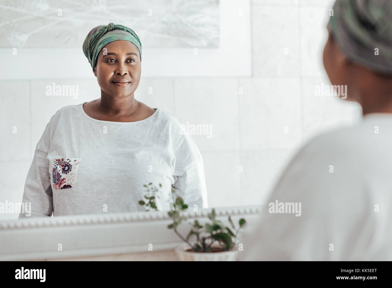 African woman wearing headscarf hi-res stock photography and images - Alamy