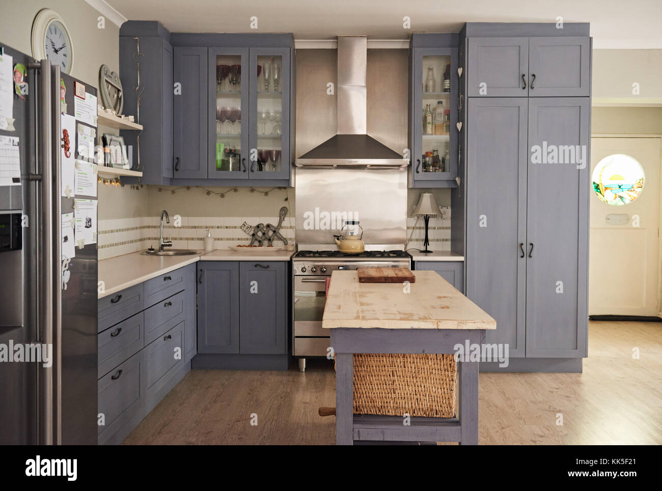 Country style kitchen with modern appliances in a contemporary home Stock Photo