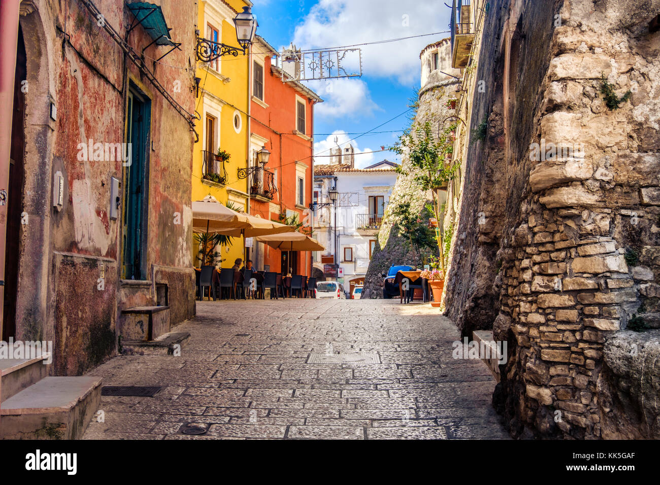 colorful south italy village alley in Apulia in the town of Vico del Gargano Stock Photo