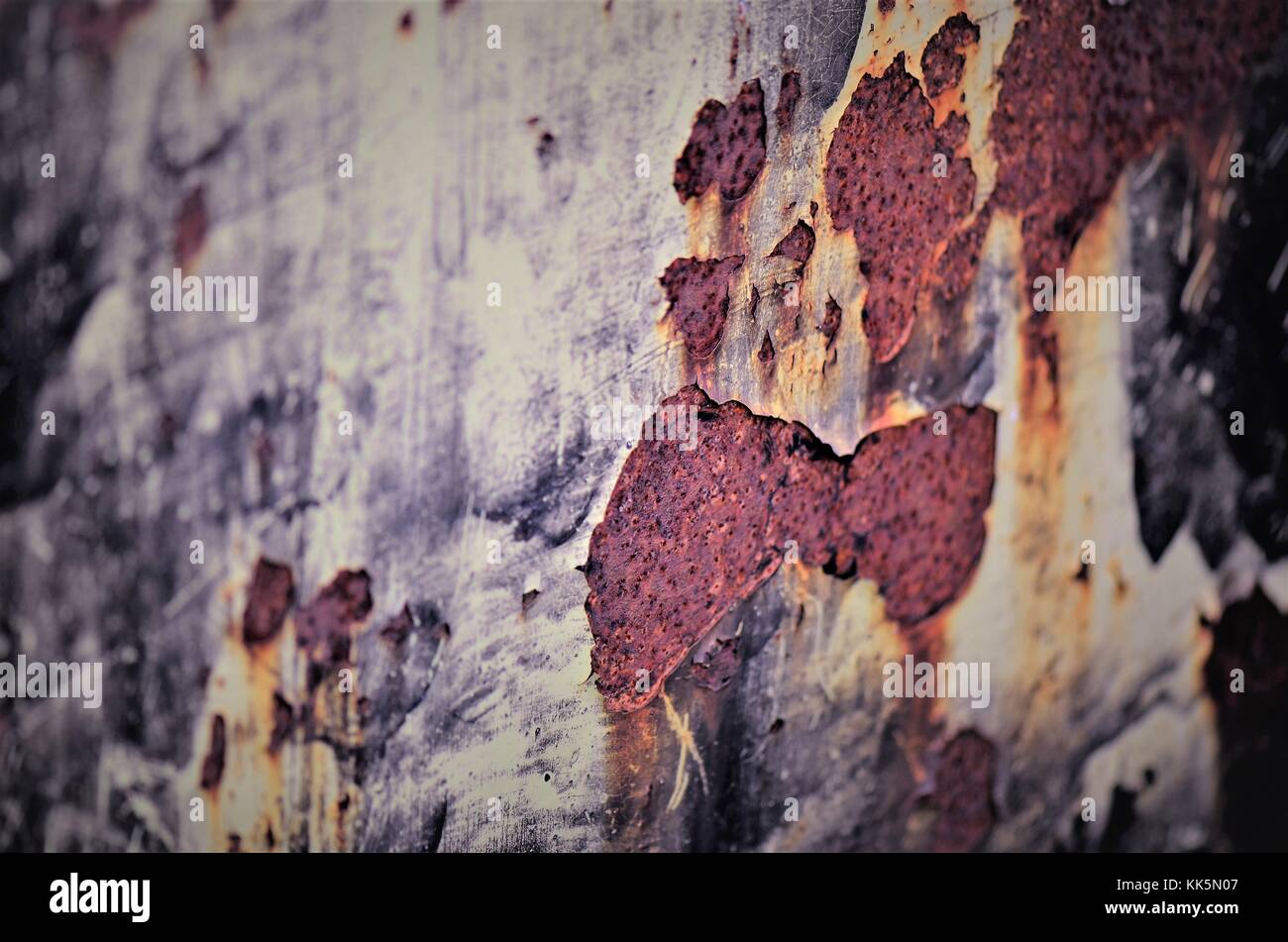Rusted, corrosion and age coloured metal surface Stock Photo