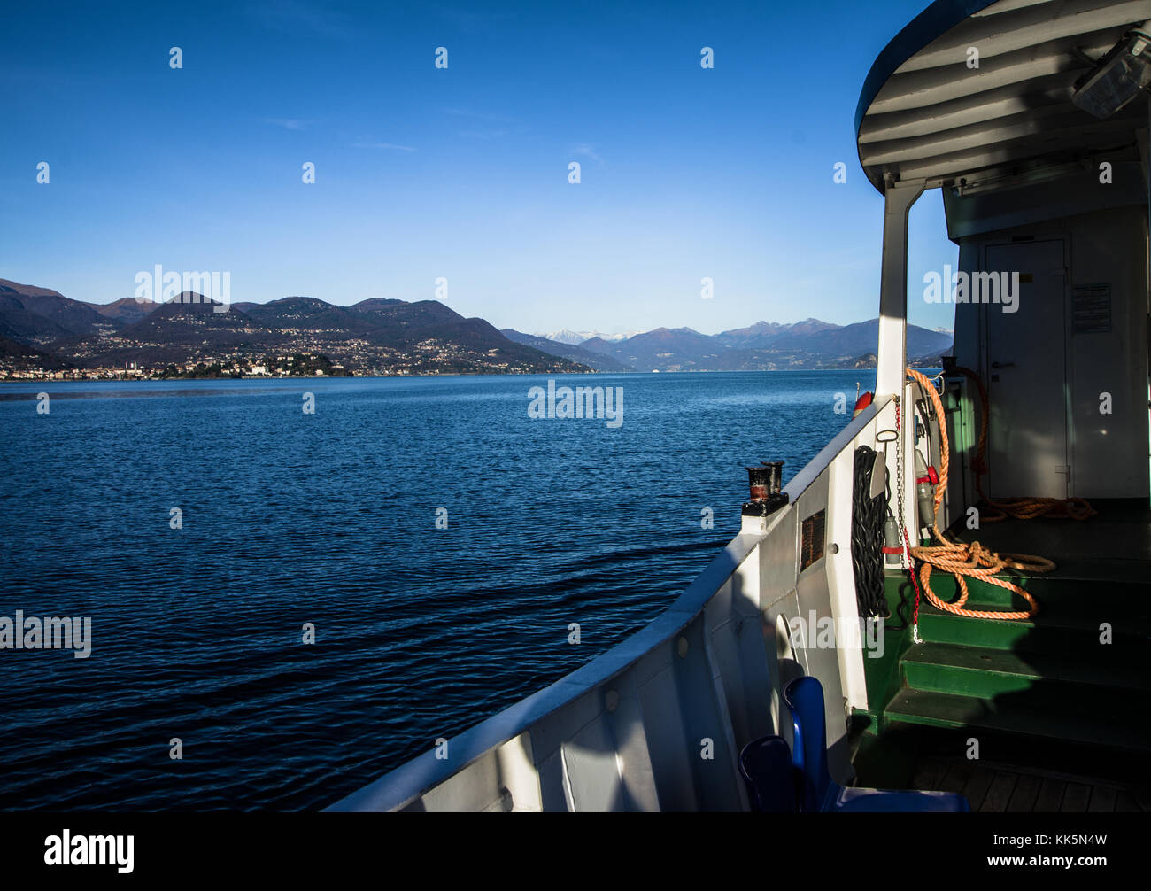 admiring the winter landscape during a cruise on Lake Maggiore, Italy Stock Photo