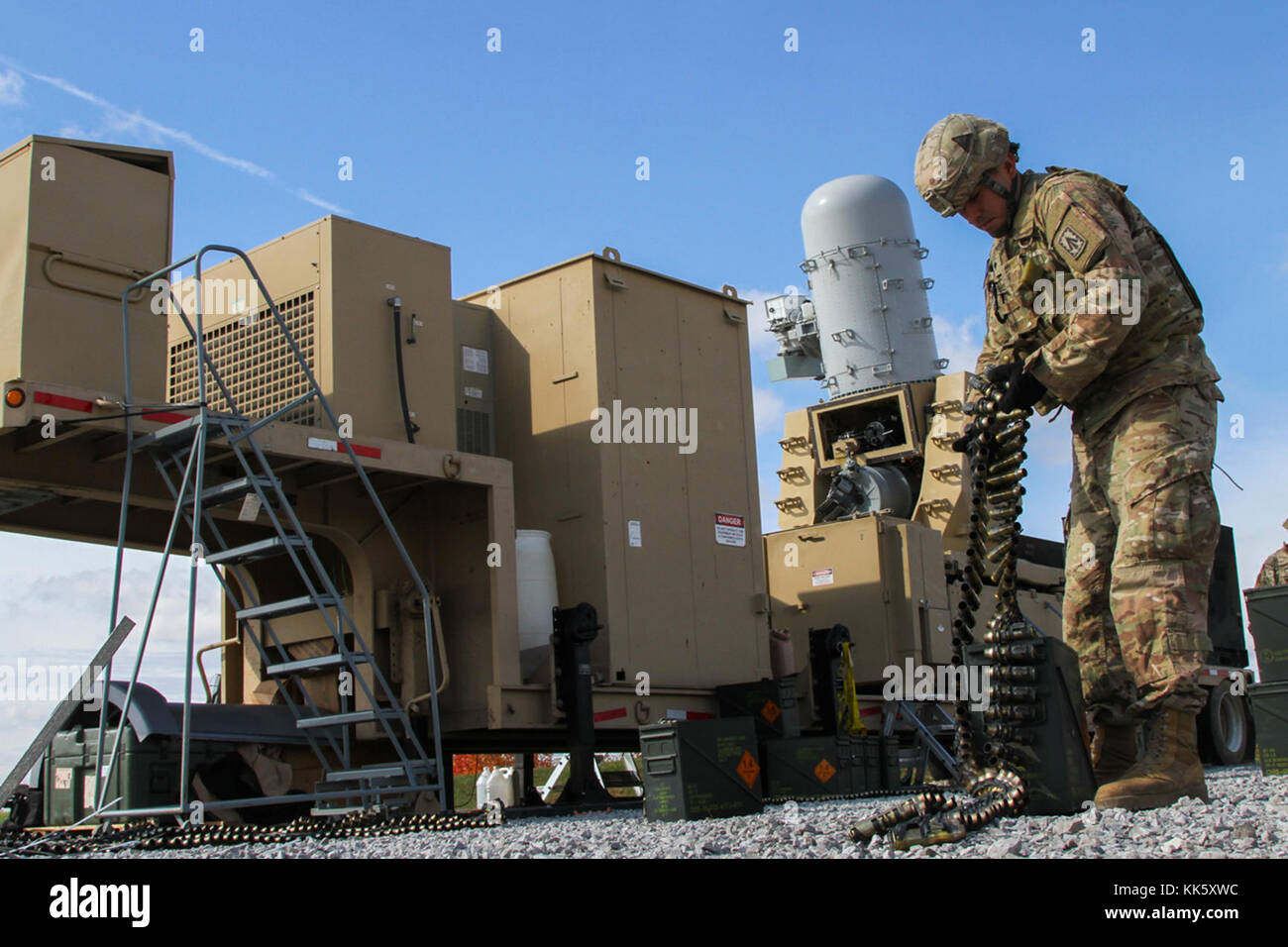 Spc. Ramiro Ramirez, a field artillery firefinder radar operator with Battery A, 2nd Battalion, 44th Air Defense Artillery Regiment, assigned to 108th Air Defense Artillery Brigade, and attached to the 101st Airborne Division (Air Assault) Sustainment Brigade, 101st Abn. Div., puts away the Land-Based Phalanx Weapon System’s ammo, Nov. 8, 2017, during the battalion’s live fire exercise on Fort Campbell, Kentucky. (U.S. Army photo by Spc. Alexes Anderson/101st SBDE Public Affairs) Stock Photo