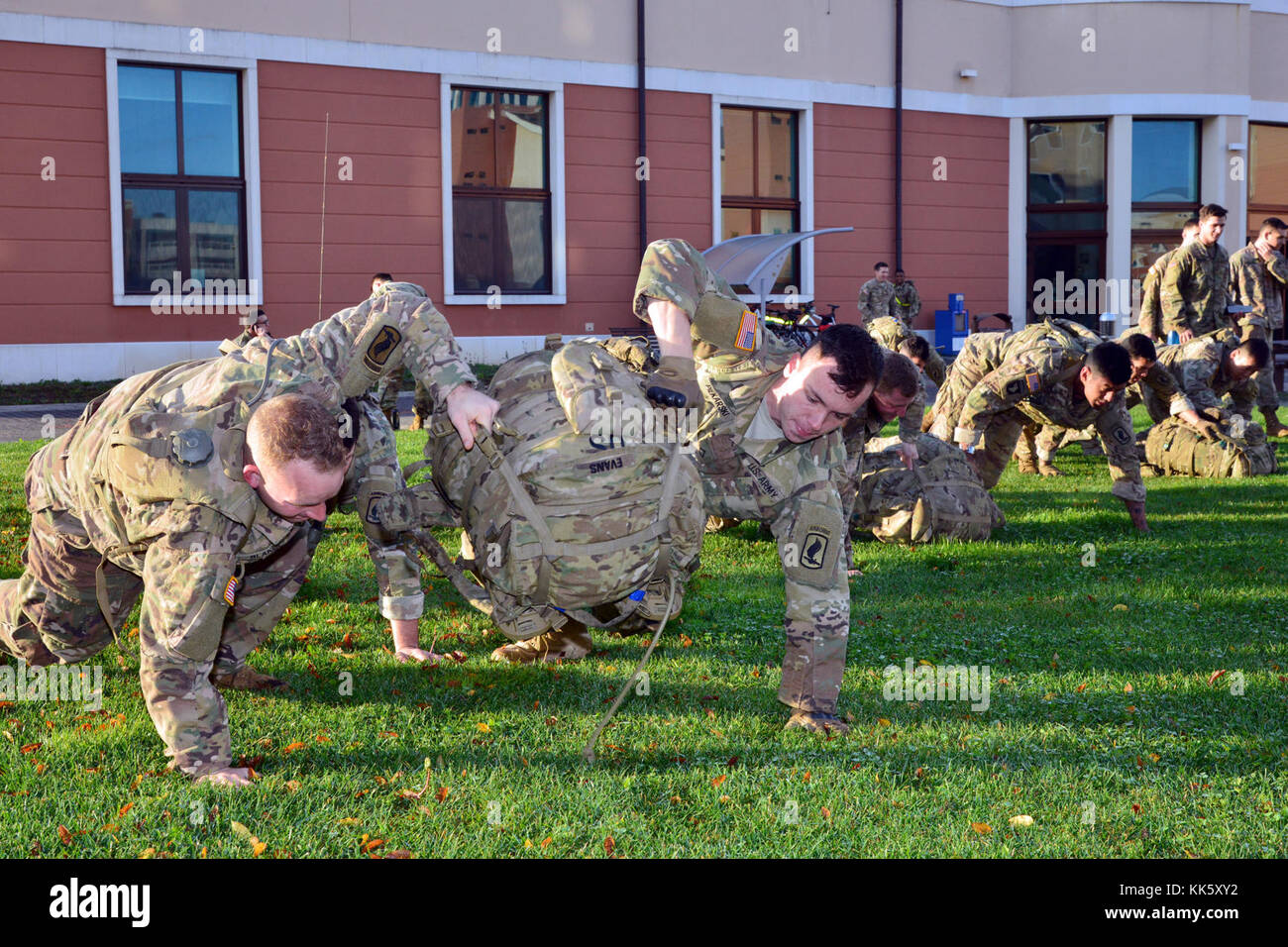 U.S. Army Paratroopers assigned to 2nd Battalion, 503rd Infantry Regiment, 173rd Airborne Brigade, conduct a 200-meter bear crawl during a Rockvember Event for Brostrom Challenge, at Caserma Del Din, Vicenza, Italy, Nov. 8, 2017.   The 173rd Airborne Brigade is the U.S. Army Contingency Response Force in Europe, capable of projecting ready forces anywhere in the U.S. European, Africa or Central Commands areas of responsibility within 18 hours.   (U.S. Army photo by Massimo Bovo) Stock Photo