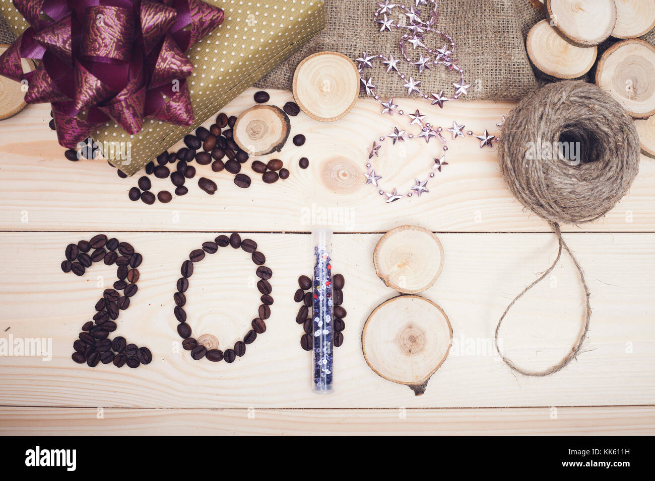 2018 inscription of coffee beans, shiny purple christmas decorations Stock Photo