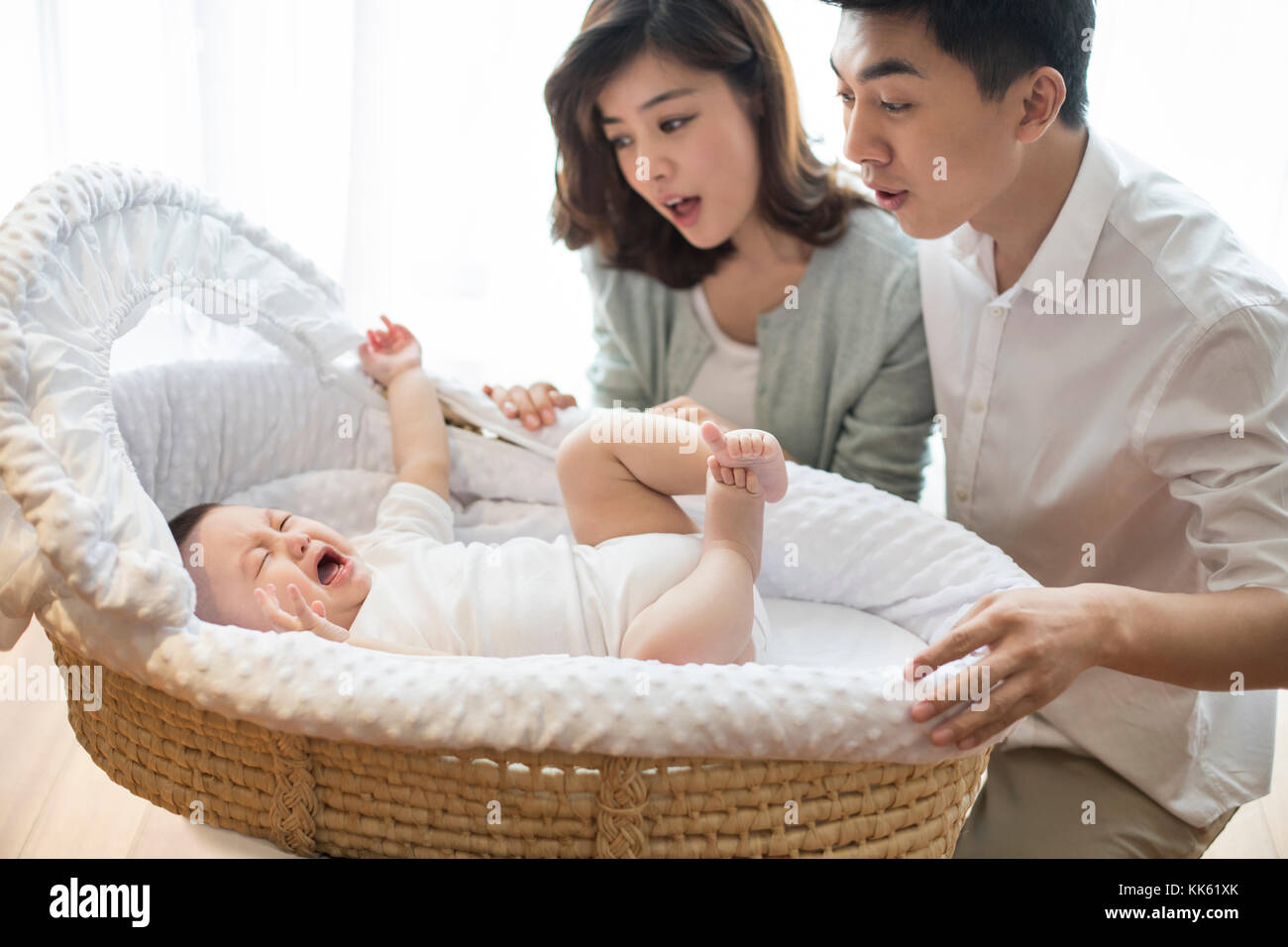 Happy young Chinese family Stock Photo