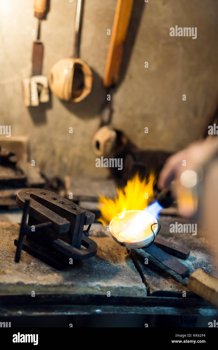 Jeweler melting gold Stock Photo Alamy