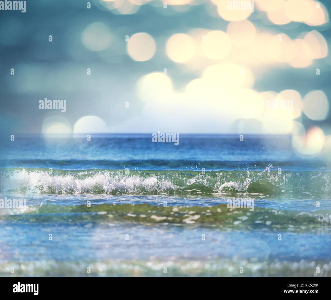 Wave on the beach Stock Photo - Alamy