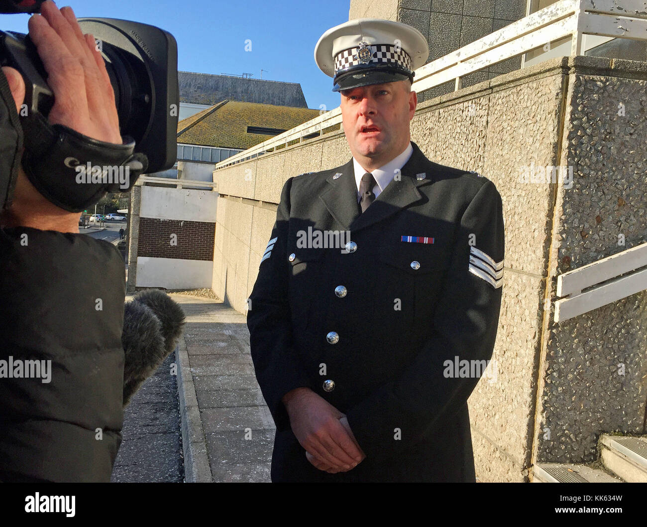 Sergeant Dan Pitcher, of East Sussex roads policing unit, speaking to reporters outside Brighton Crown Court, where builder Adam McDermott was jailed for six-and-a-half years after he left a father for dead in a high speed hit-and-run which was caught on CCTV. Stock Photo