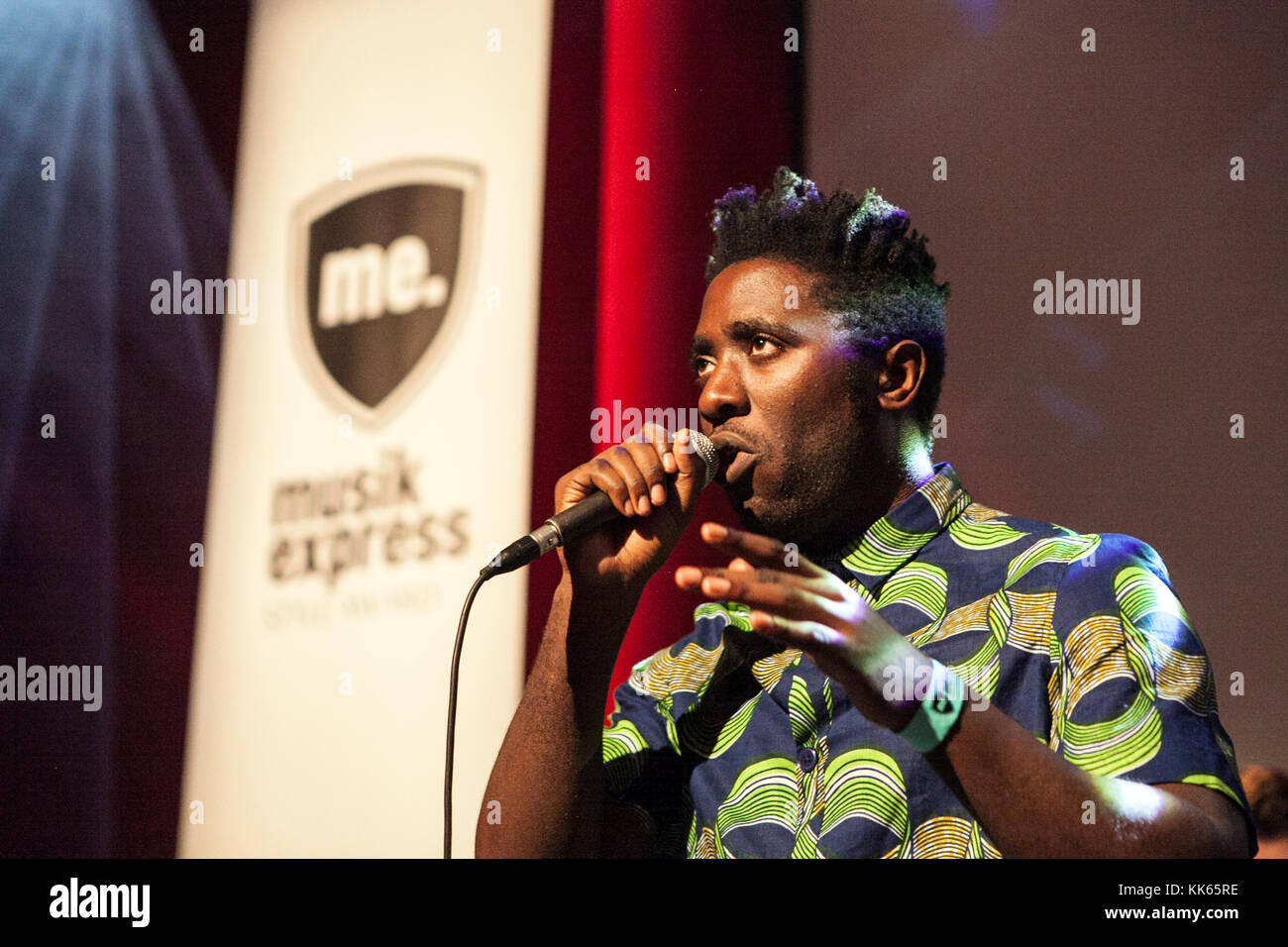 The British musician, singer and songwriter Kelechukwu Rowland Okereke is better known by his stage name Kele and is here pictured live on stage at E-Werk in Berlin. Kele Okereke is also known as the guitarist and singer of the indie rock band Bloc Party. Germany, 15/10 2014. Stock Photo