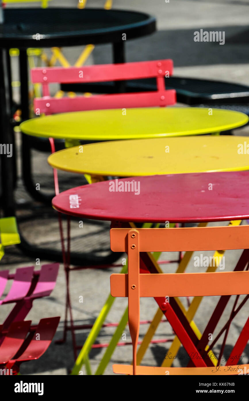A small outdoor cafe, downtown Halifax. Where the color of ta tables