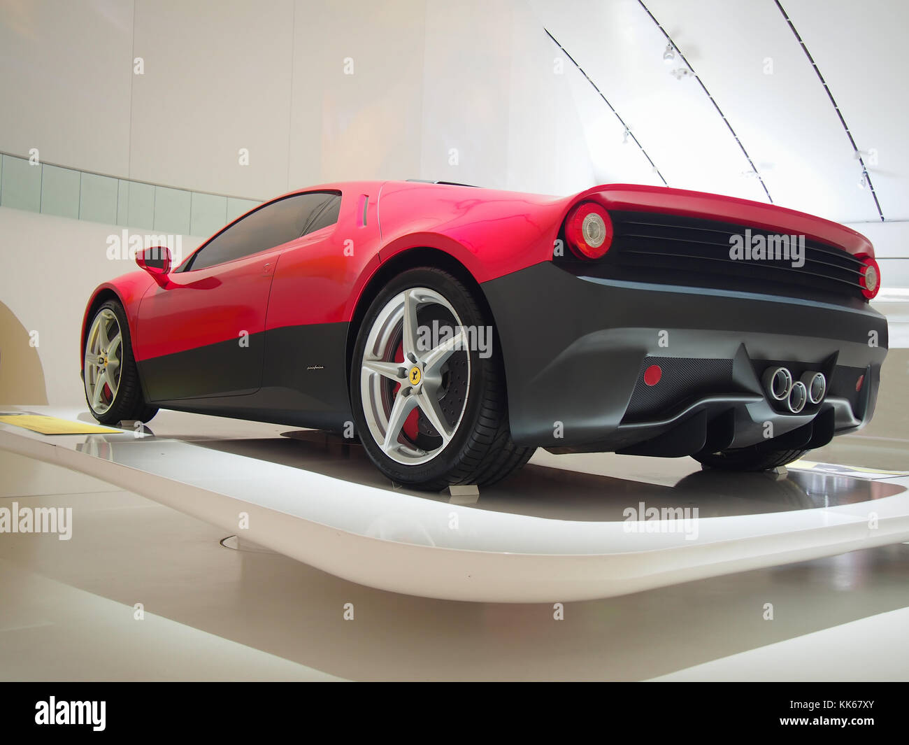 2012 Ferrari SP12 EC in the Enzo Ferrari Museum in Modena, Italy. It was a part of exhibition «Driving with the Stars». Stock Photo