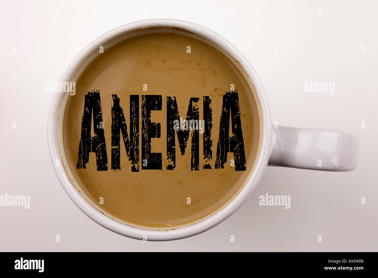 Word, writing Anemia text in coffee in cup. Business concept for Medical Diagnosis Iron