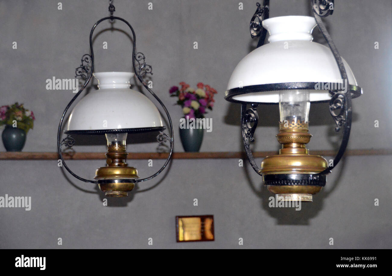 Old Oil Lamps Hanging from the Roof in All Saints Church on the Island of  Bryher in the Isles of Scilly, Cornwall, United Kingdom.UK Stock Photo -  Alamy