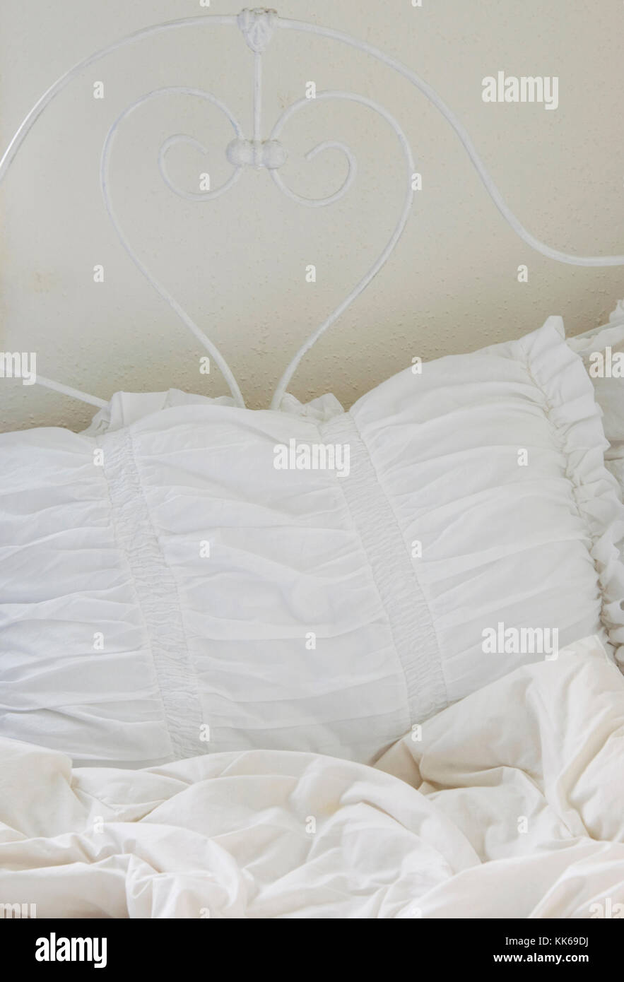 An image of a white bed Stock Photo