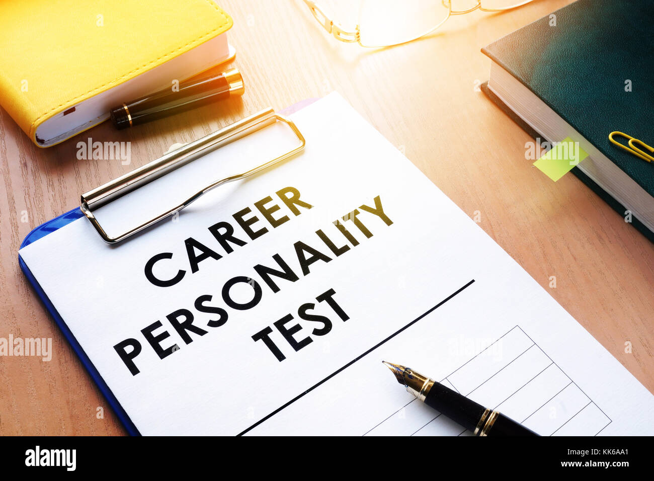 Clipboard with Career personality test on an office desk. Assessments concept. Stock Photo