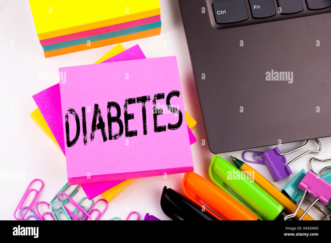 Writing text showing Diabetes made in the office with surroundings such