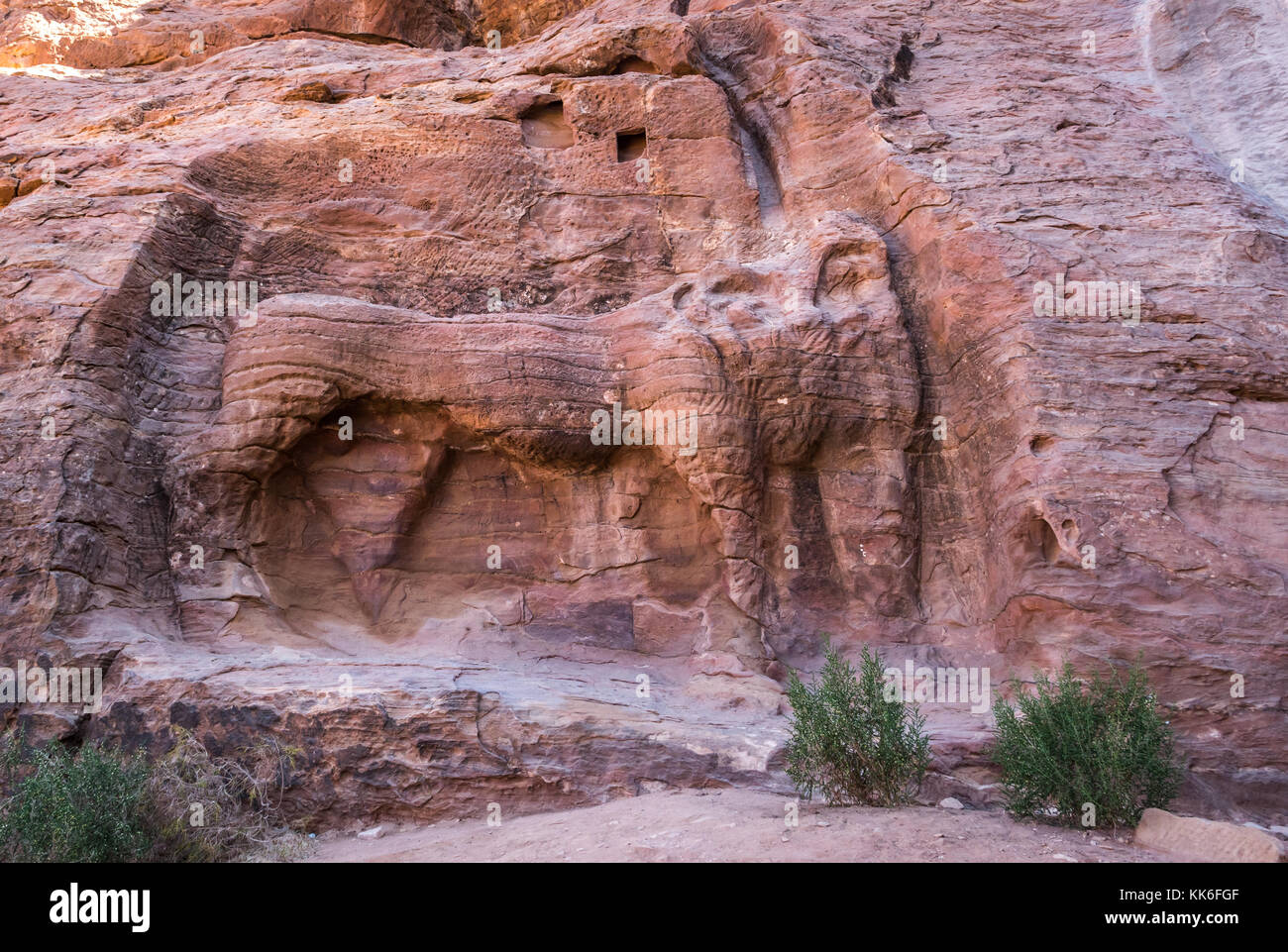The Lion Monument, on walking route to High Place of Sacrifice, a fountain carved from pink sandstone, Petra, Jordan, Middle East Stock Photo
