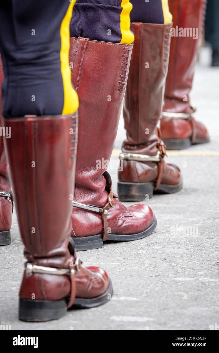 Close-up of mounties, Royal Canadian Mounted Police (RCMP) officer boots in line, Remembrance Day, London, Ontario, Canada. Stock Photo