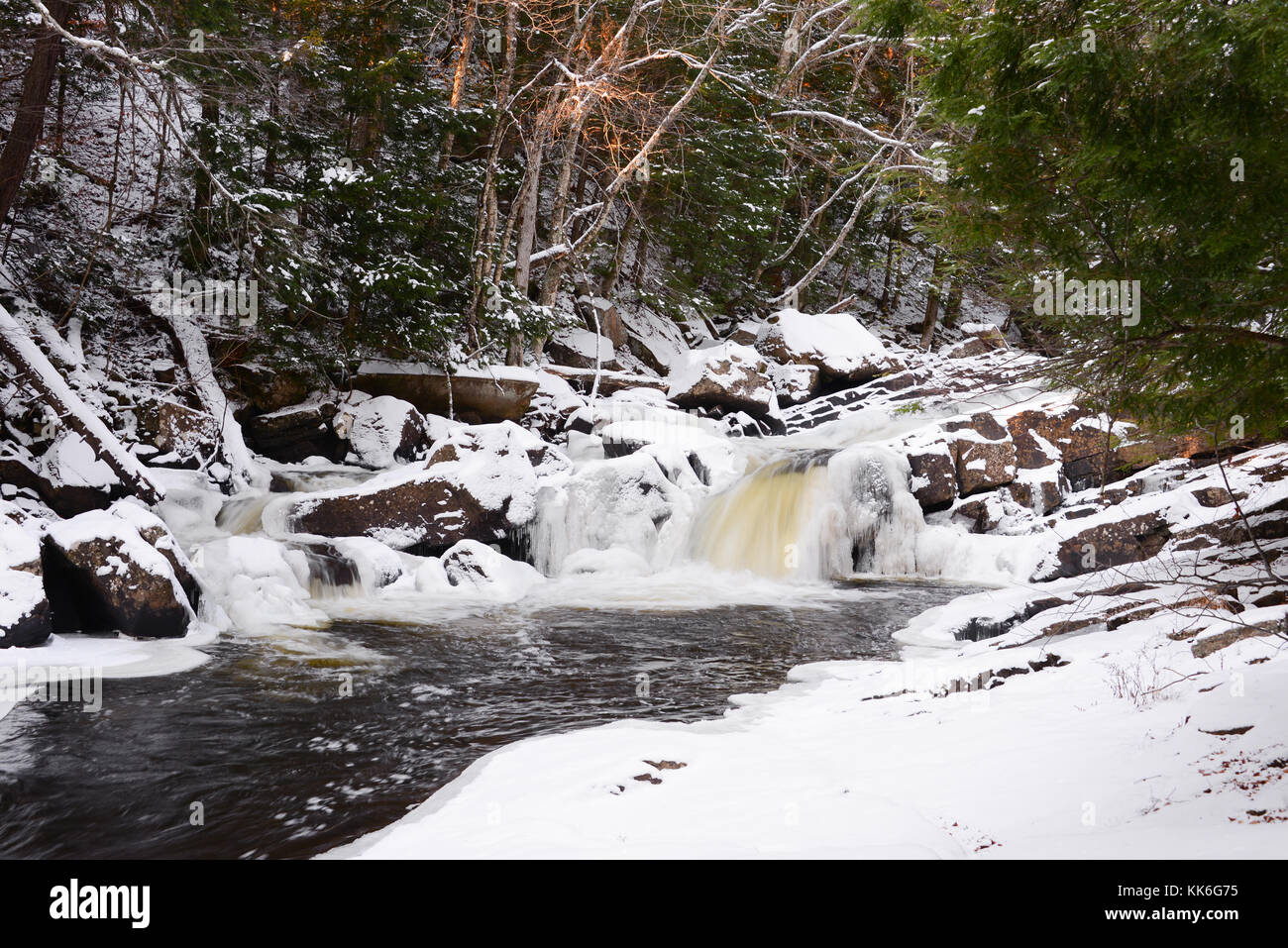 Austin Falls - winter waterfalls with snow and ice on the Sacandaga River in the Adirondack Mountains, NY, USA Stock Photo