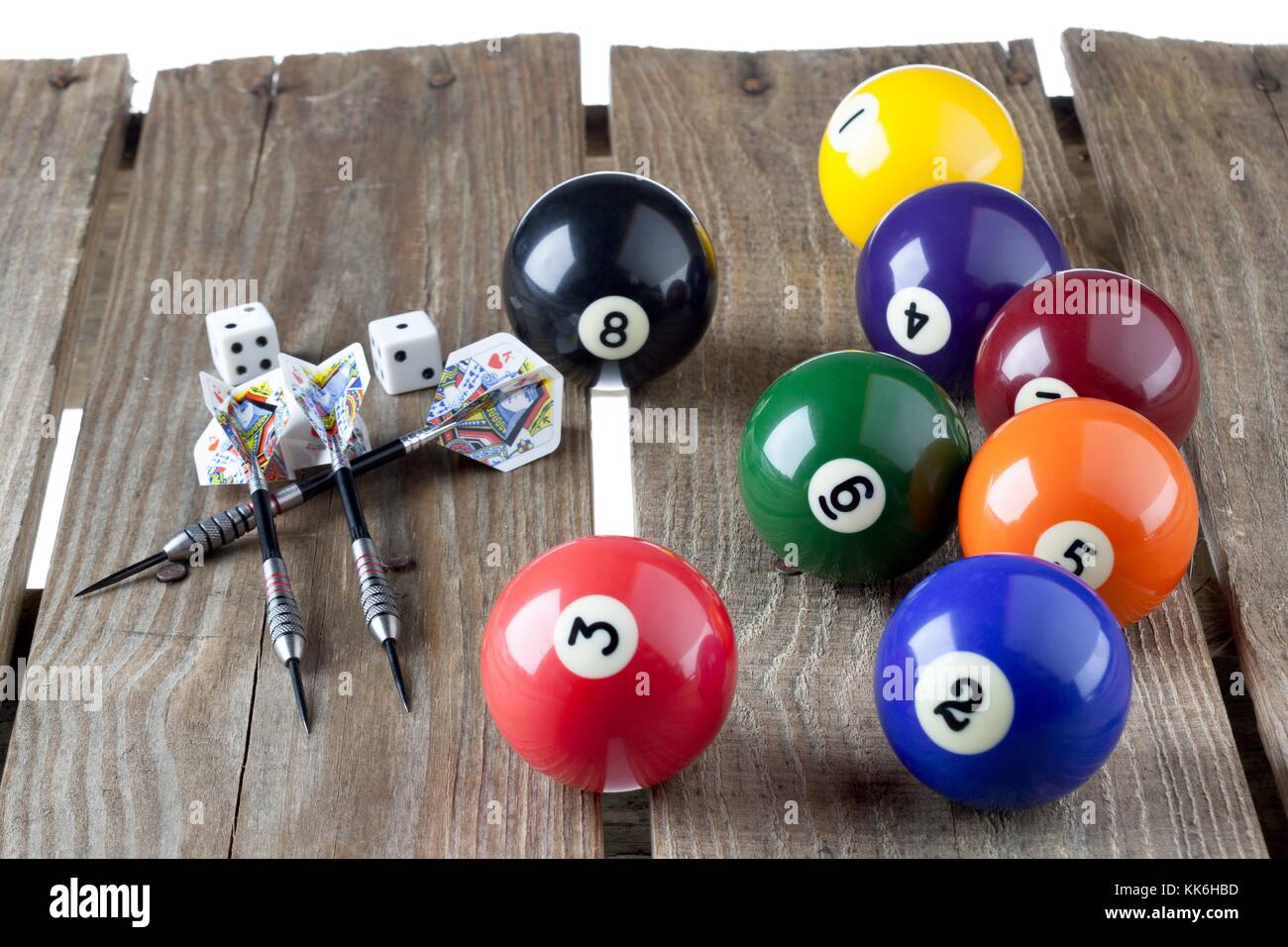 dart pins dice and billiard balls on the table Stock Photo Alamy
