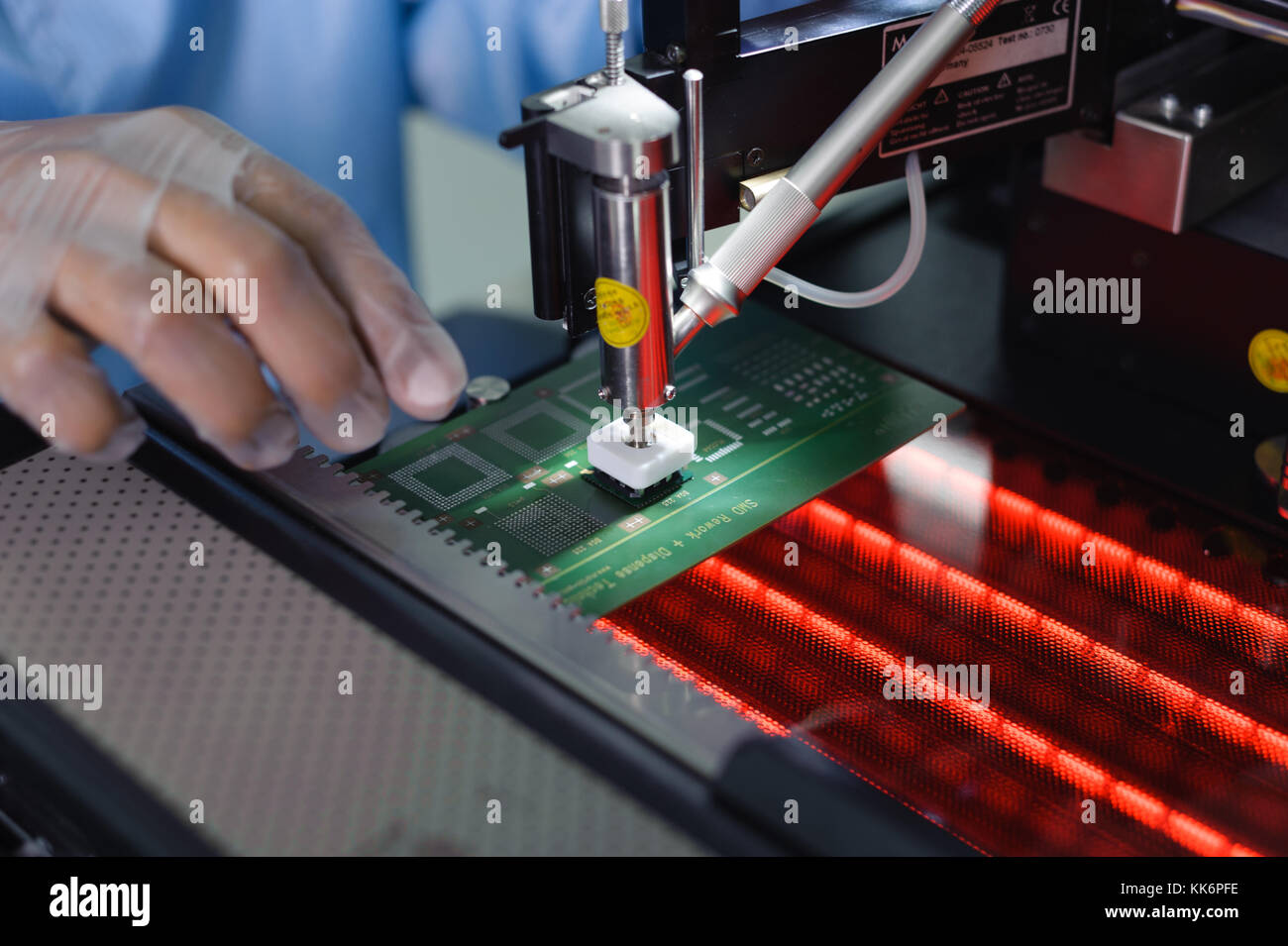 Assembling micro electronic board Stock Photo