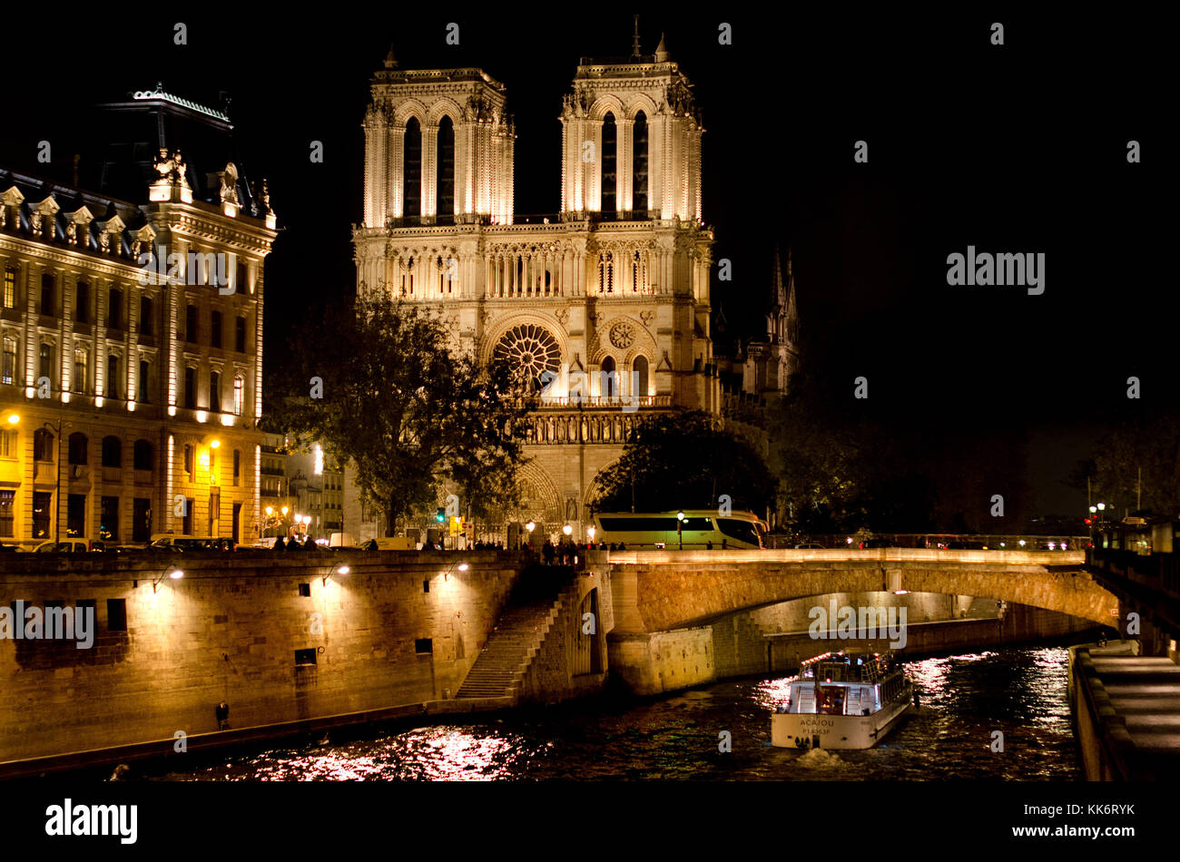 Paris, France. Notre Dame cathedral / Notre-Dame de Paris on Isle de la Cite. Gothic. Lit up at night Stock Photo