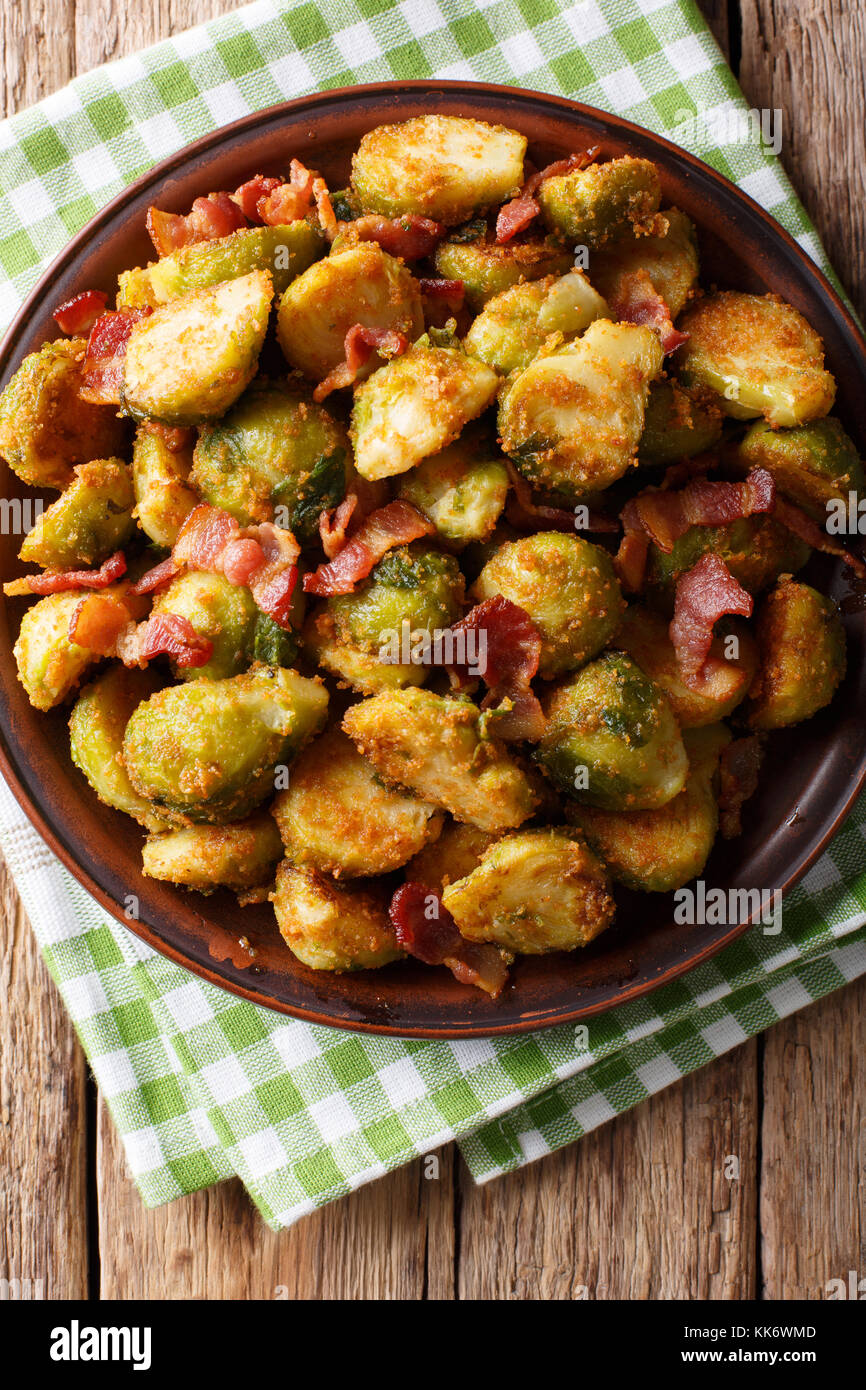 roasted brussels sprouts in breadcrumbs with crispy bacon closeup on