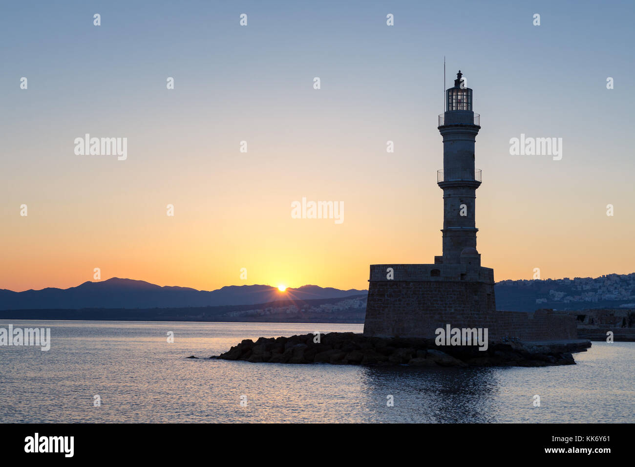 Chania lighthouse at sunrise, Chania, Crete, Greece Stock Photo