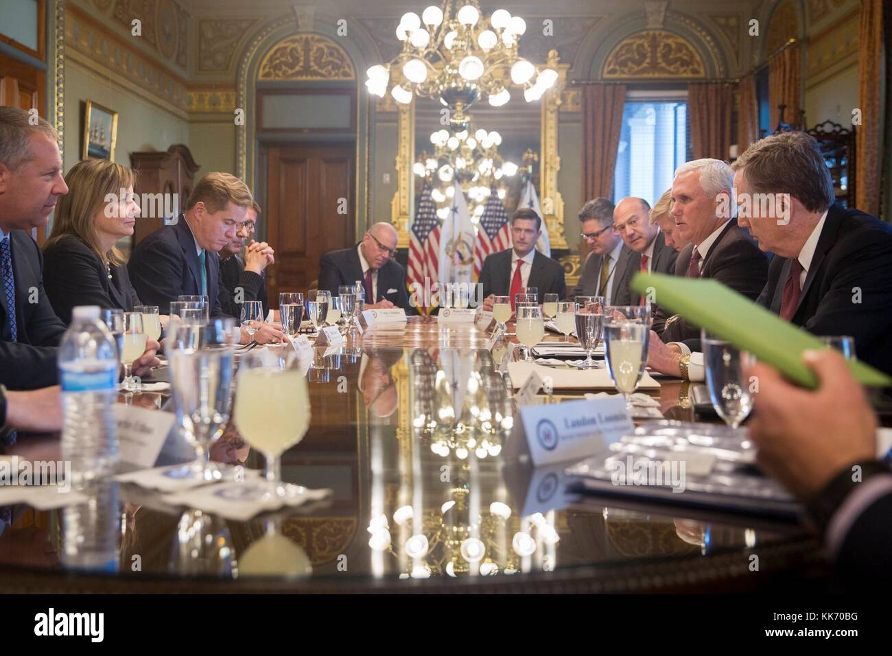 U.S. Vice President Mike Pence, right, speaks with executives from leading automobile companies during the U.S. Auto Council meeting at the White House November 27, 2017 in Washington, DC. The meeting was held to address auto manufacturers concerns over NAFTA. Stock Photo
