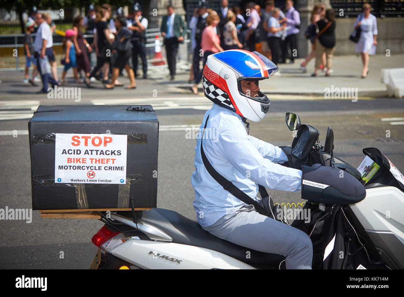 Moped riders, including couriers and delivery drivers, protest in ...
