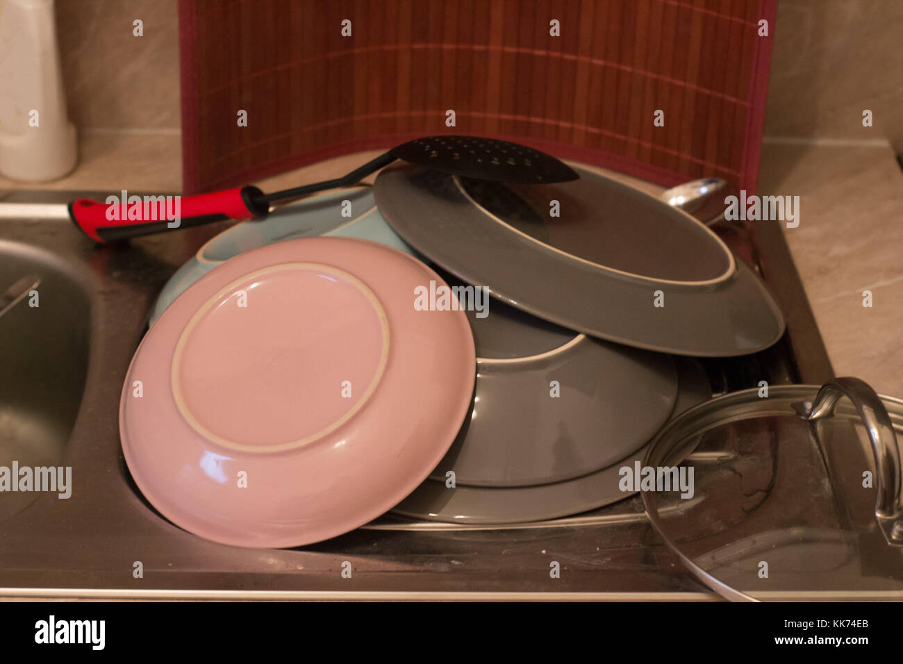 washed dishes and plates and spoons silverware Stock Photo Alamy