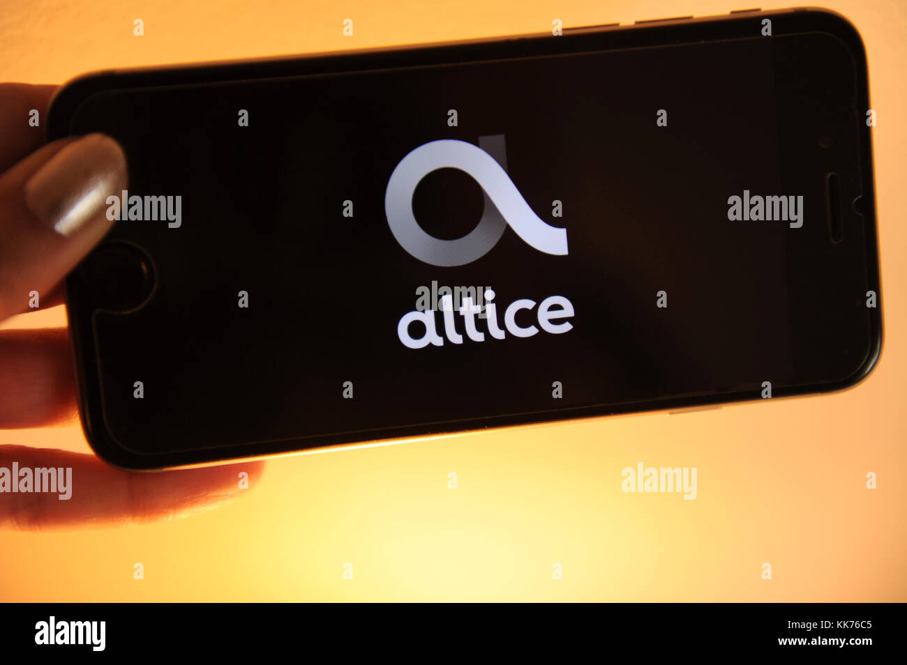 The Altice logo seen on a smartphone. Altice is a multimational telecoms company based in the Netherlands Stock Photo