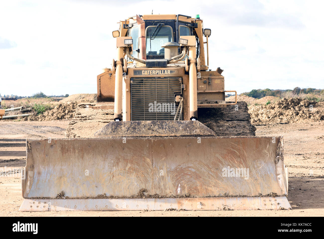 Parked yellow Caterpillar bulldozer dozer at a local sand gravel pit in ...
