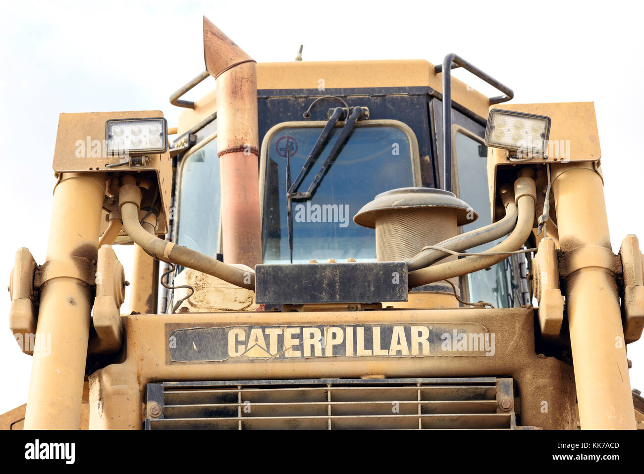 Parked yellow Caterpillar bulldozer dozer at a local sand gravel pit in ...