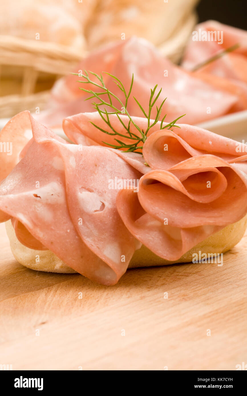 sandwich with mortadella with thin cutted slices of italian mortadella