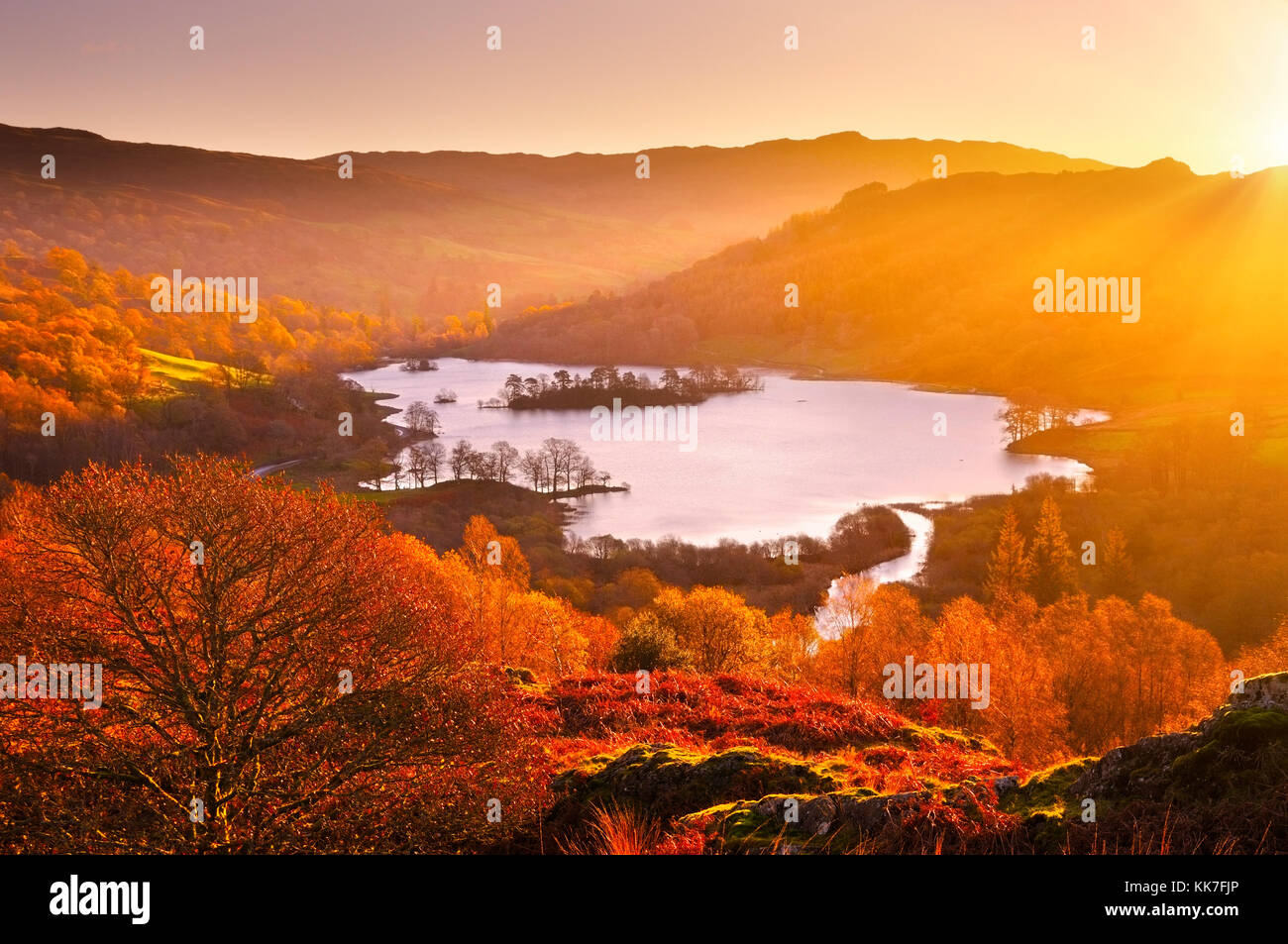 Rydal Water at sunrise, Lake District, UK.  Elevated view overlooking the beautiful lake and autumn landscape from White Moss Common. Stock Photo