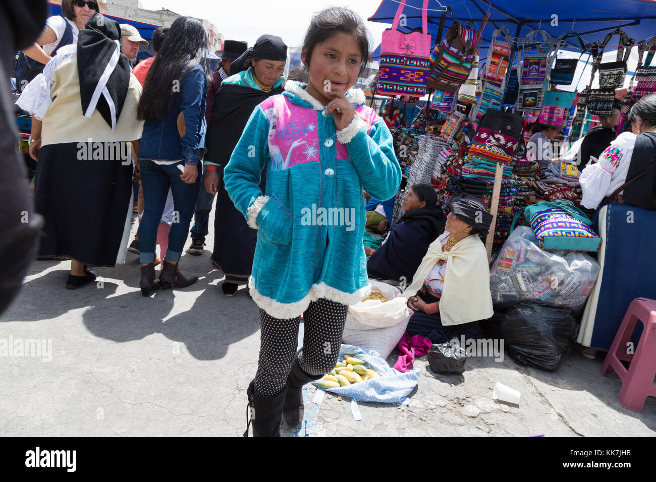 Ecuador child - young Ecuadorean girl aged 10 years, Otavalo market, Otavalo, Ecuador, South America Stock Photo