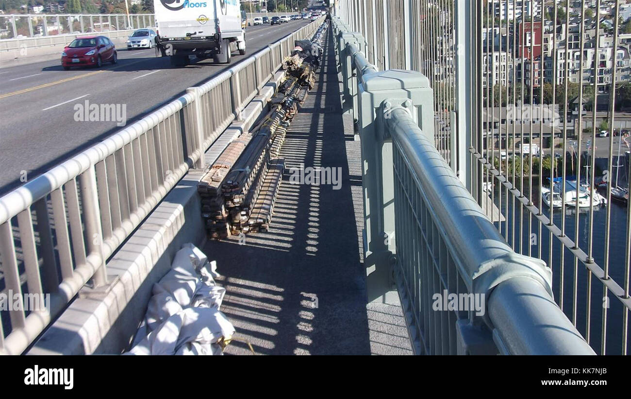 In Seattle's sunshine, the newly painted handrail on the SR 99 Aurora