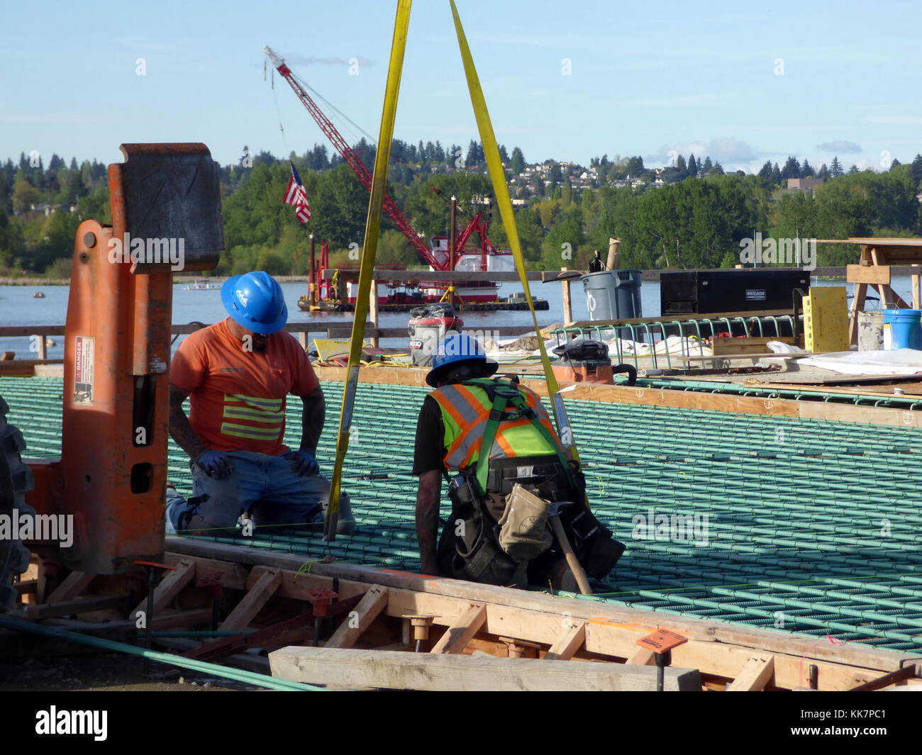 Wabn WABN crew members work to install rebar for the final section of the ...