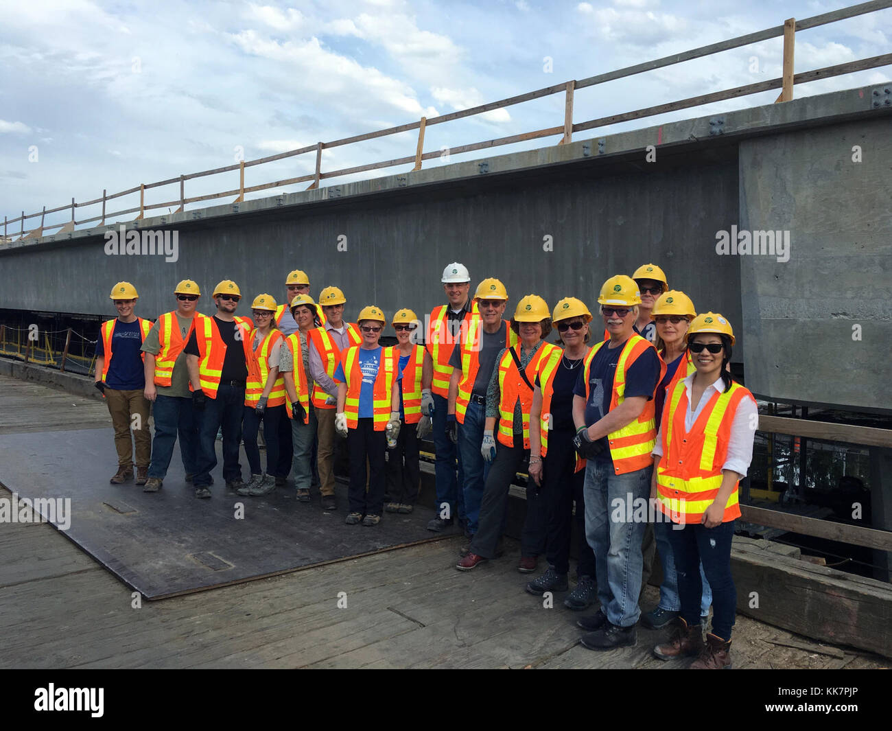 Wabn One of the tour groups smiles for a photo with the new WABN structure ...