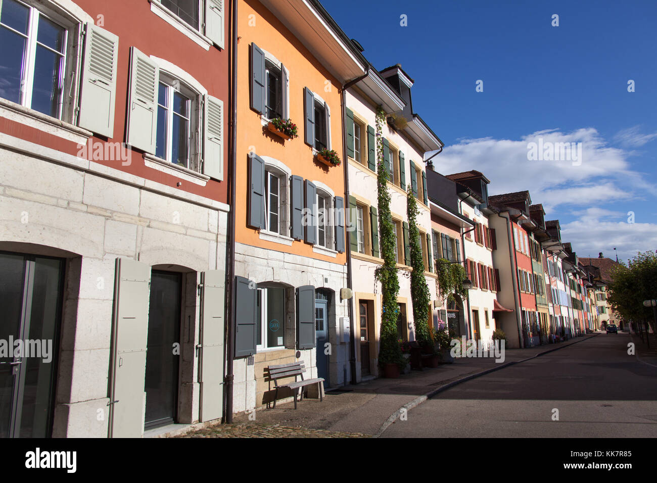 Town of Le Landeron, Switzerland. Picturesque colourful view of houses and shops, lining the