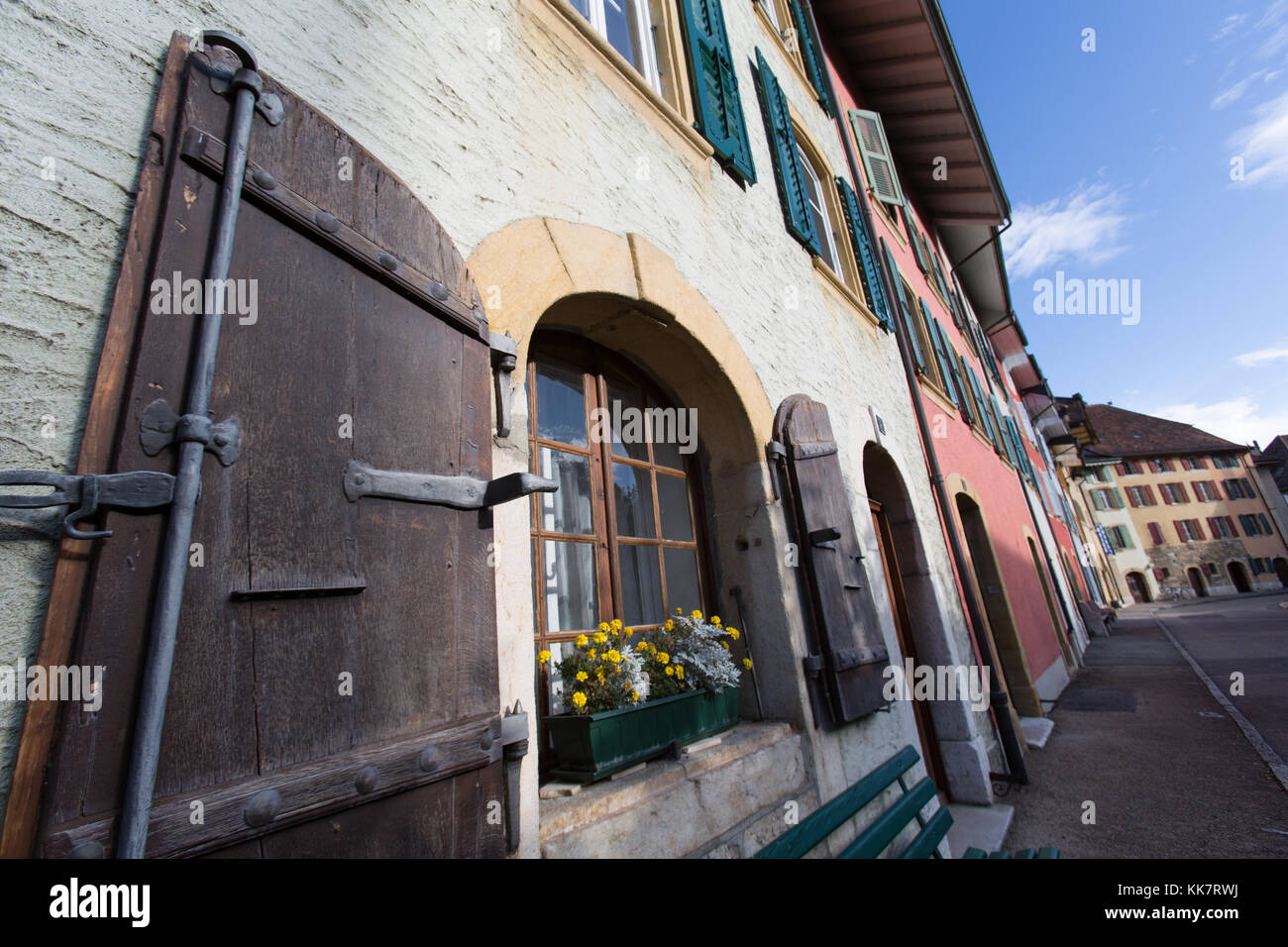 Town of Le Landeron, Switzerland. Picturesque colourful view of houses and shops, lining the