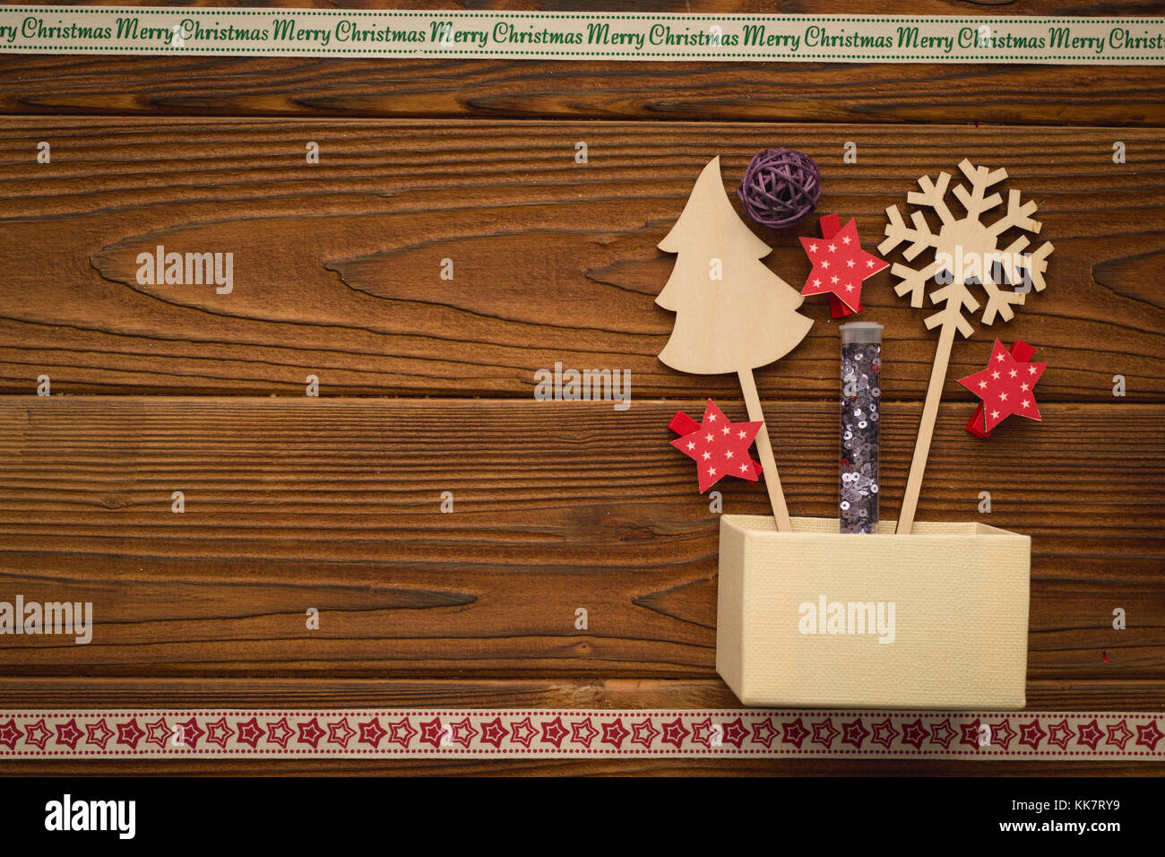 Christmas background with a box and toys Stock Photo - Alamy