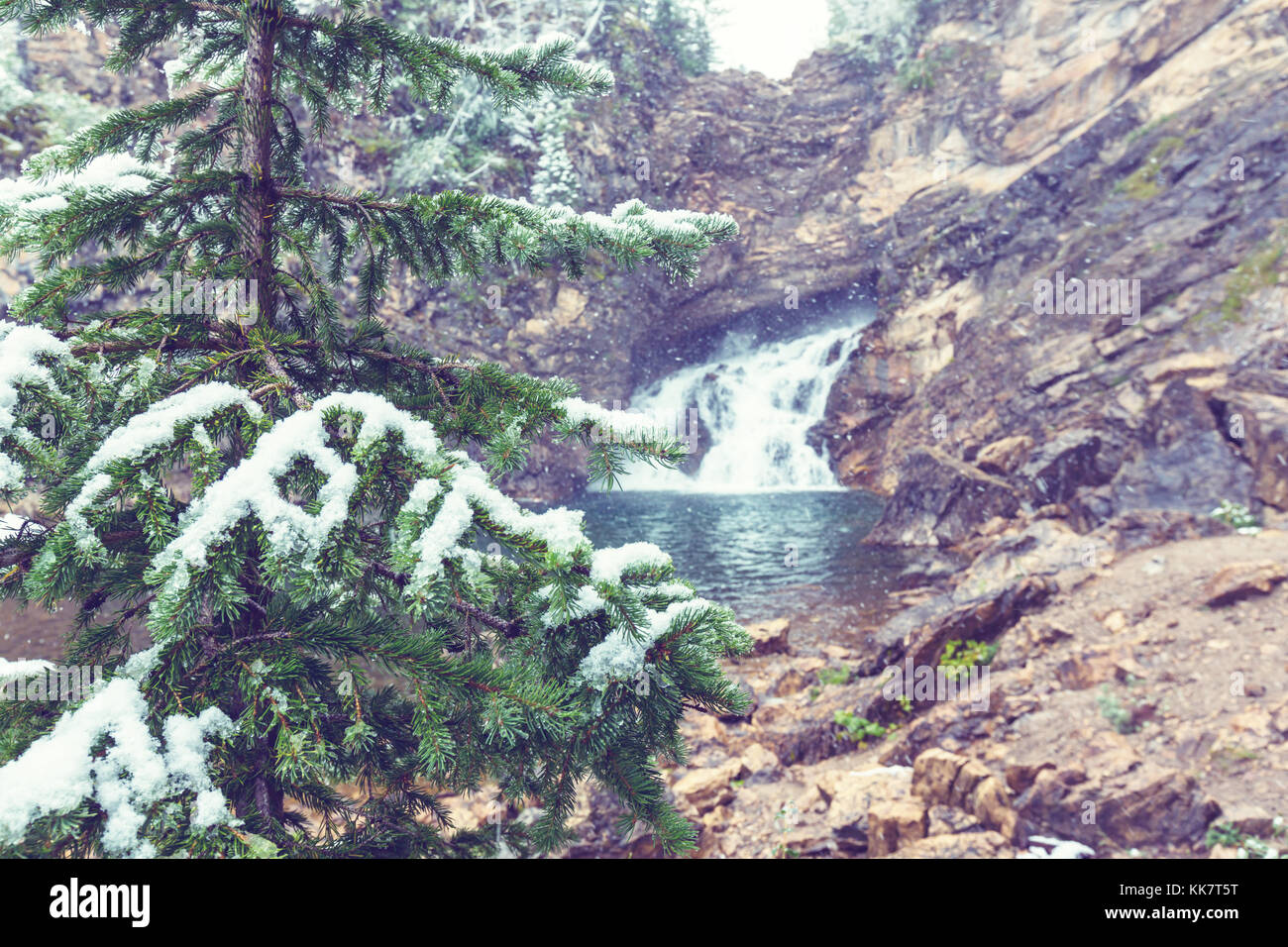 Early winter with first snow covering rocks and woods in the Glacier ...