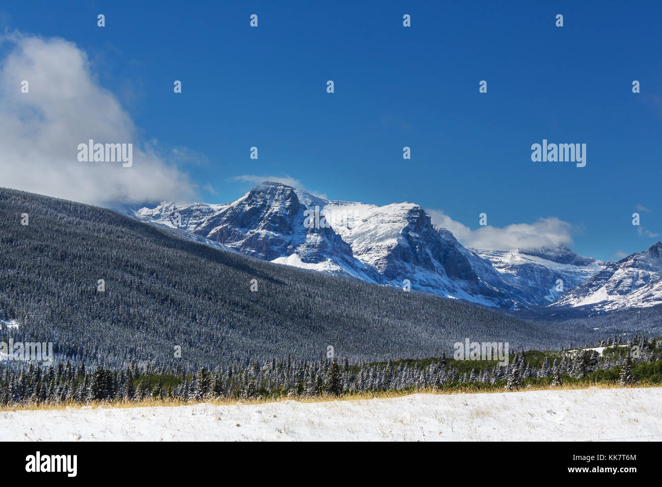 Early winter with first snow covering rocks and woods in the Glacier ...