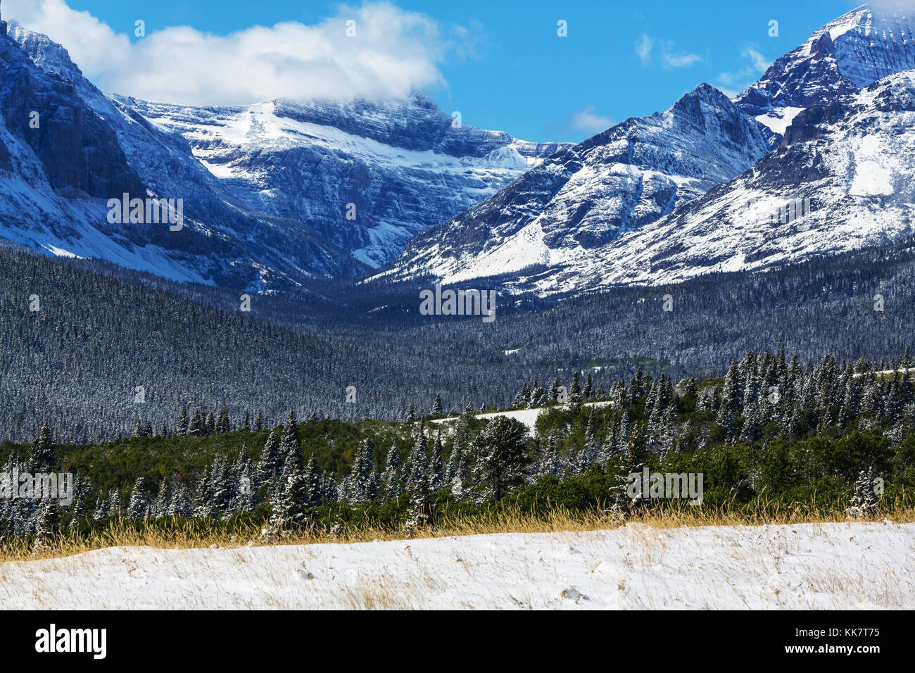 Early winter with first snow covering rocks and woods in the Glacier ...