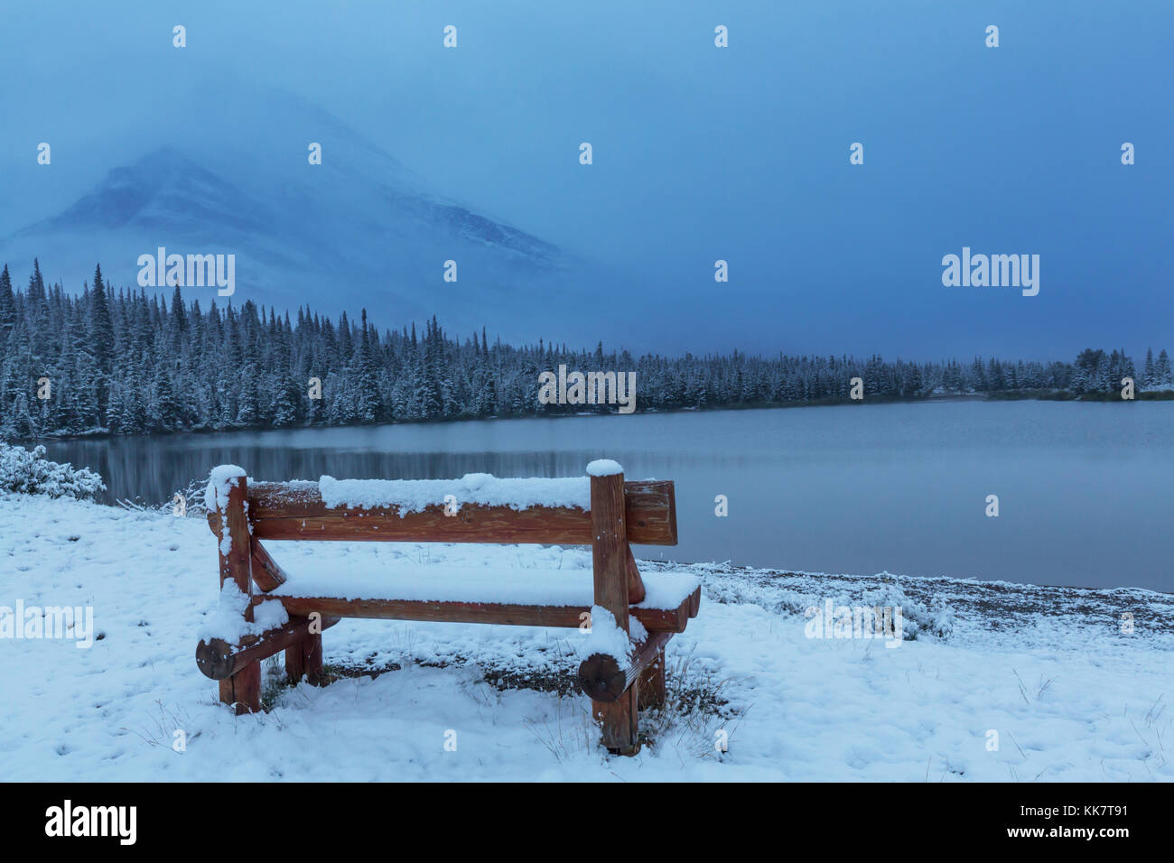 Early winter with first snow covering rocks and woods in the Glacier ...