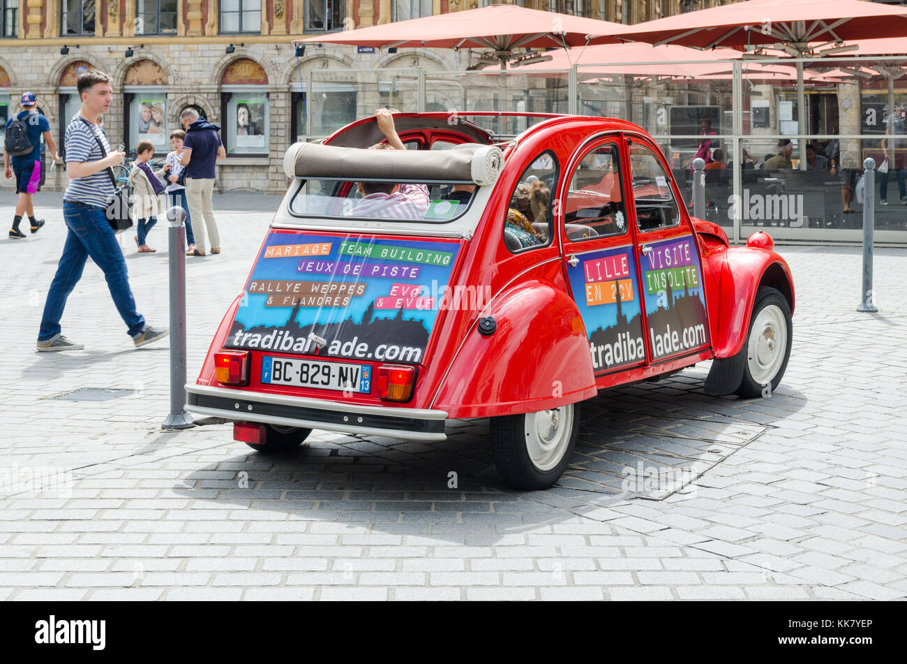 Tradi' Balade de Lille visitor sightseeing trips in old Citroen 2CV cars Stock Photo