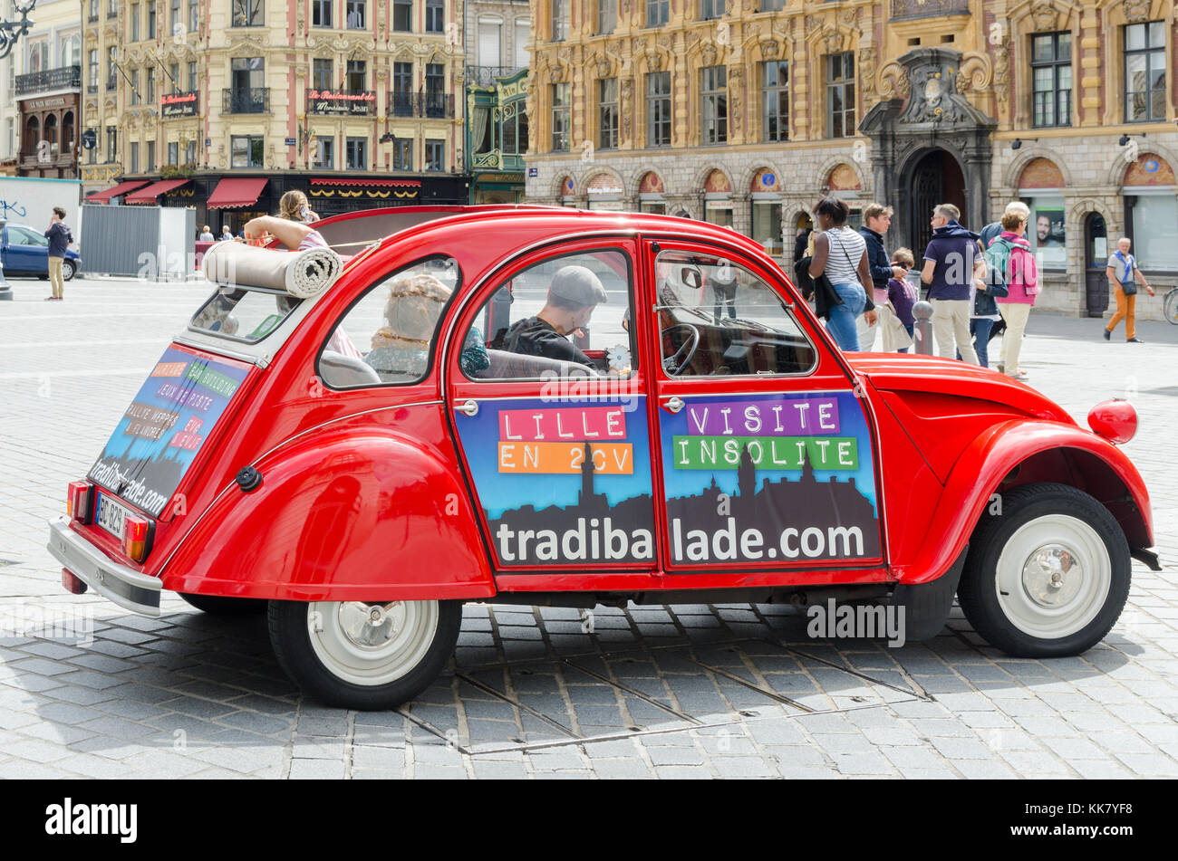 Tradi' Balade de Lille visitor sightseeing trips in old Citroen 2CV cars Stock Photo