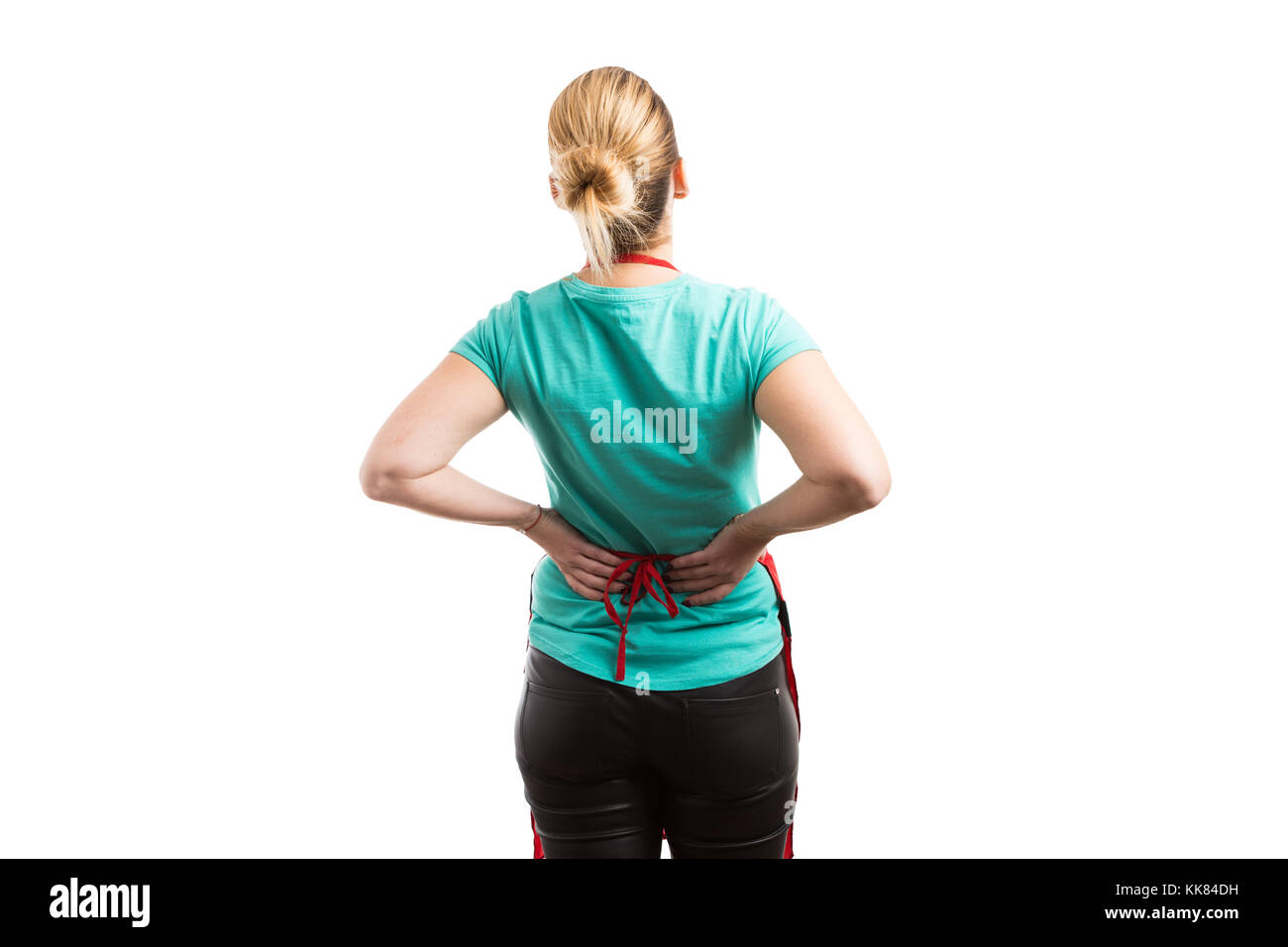 Tired housemaid or housekeeper suffering lower back pain as